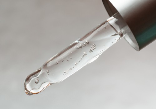 A pipette with a drop of retinol