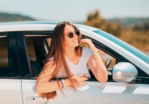 Smiling girl in the sunglasses is traveling